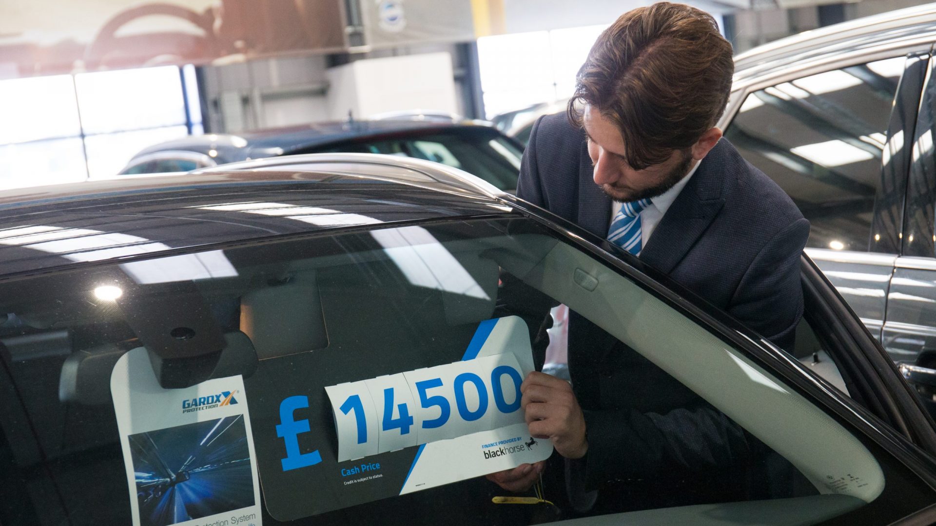 Temporary Setback or Industry Game-Changer? What the Growing Financial Crisis Means for Car Dealers